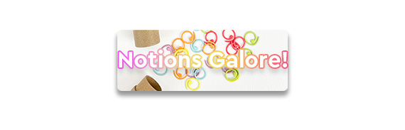 Notions Galore! text over colorful stitch markers on a white background