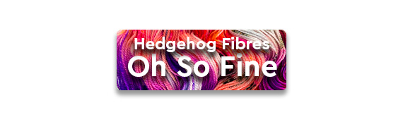 Hedgehog Fibres Oh So Fine text over pink and purple colorful yarn