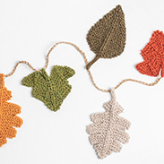 Mini knit leaves on a table