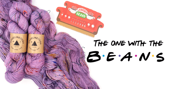 The One With the Beans with two skeins of purple speckled yarn