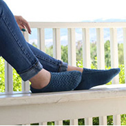 A model wearing knit ankle socks