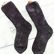 A pair of black knit socks