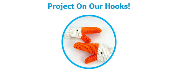 Project On Our Hooks! text with a photo of crocheted goose gloves