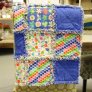 Jimmy Beans Wool Hand Made Gifts - Erin McMorris Greenhouse Flannel Baby Quilt - Royal Accessories photo
