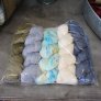 Lorna's Laces Joji Mystery Wrap MKAL Kit - Blue, White, Khaki Yarn photo